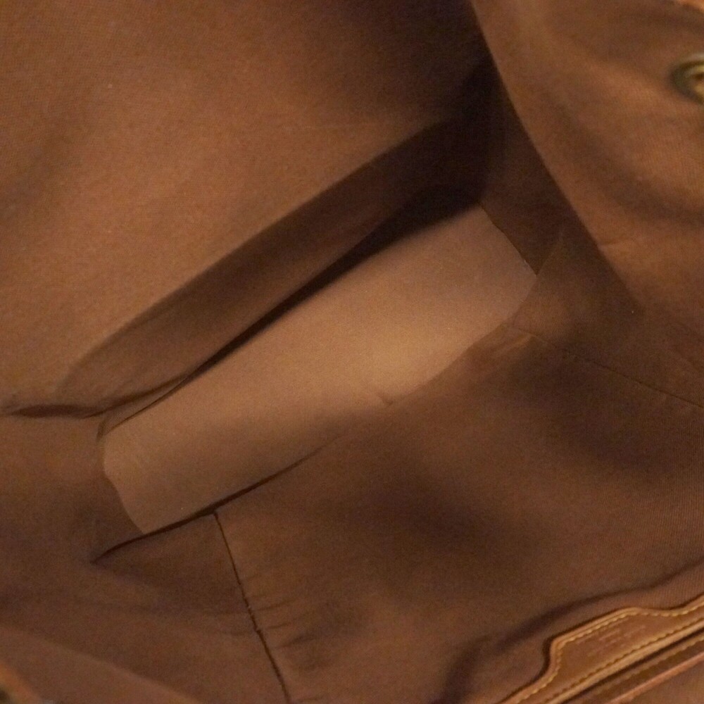 LOUIS VUITTON Brown Monogram Backpack - Picture 4 of 16